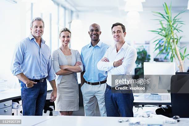 taking teamwork to the next level - four people stock pictures, royalty-free photos & images