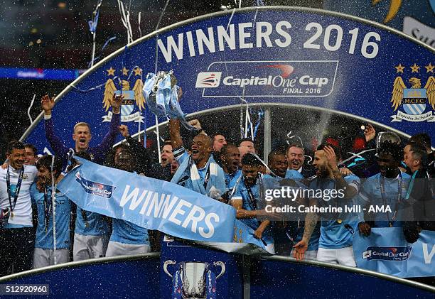 Manchester City celebrate with the Capital One cup trophy on the podium after the Capital One Cup Final match between Liverpool and Manchester City...