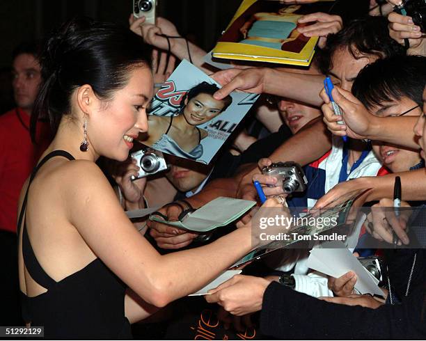 Actor Zhang Ziyi signs autographs at the North American premiere gala screening of "House of Flying Daggers" during the 29th Annual Toronto...