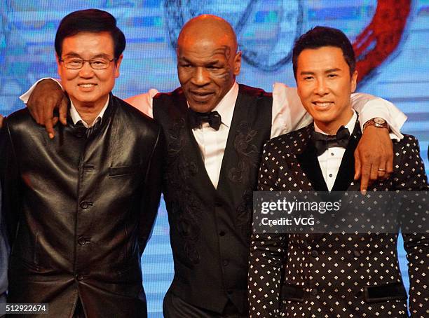 Film producer Raymond Wong Bak-ming, former heavyweight boxing champion Mike Tyson and actor Donnie Yen attend the premiere of director Wilson Yip's...
