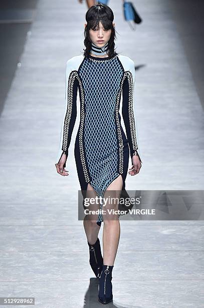 Model walks the runway at the Versace fashion show during Milan Fashion Week Fall/Winter 2016/2017 on February 26, 2016 in Milan, Italy.