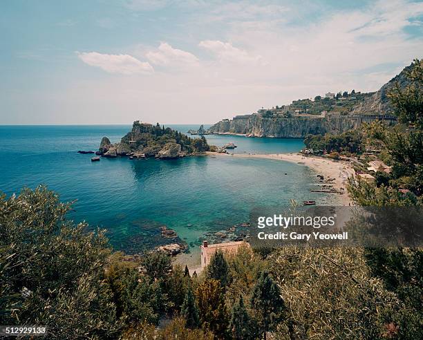 sandy beach and cove by taormina - sicilia - fotografias e filmes do acervo