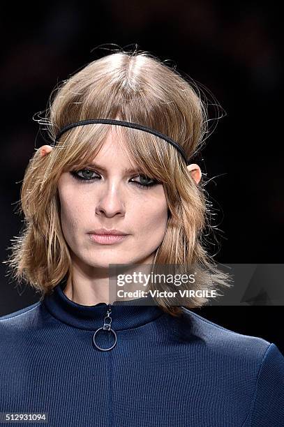Model walks the runway at the Versace fashion show during Milan Fashion Week Fall/Winter 2016/2017 on February 26, 2016 in Milan, Italy.