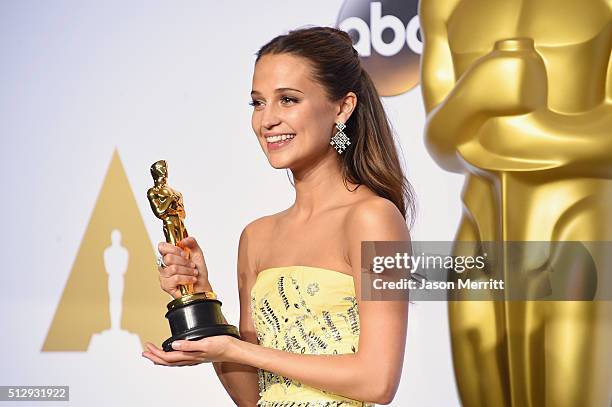 Actress Alicia Vikander, winner of Best Supporting Actress award for 'The Danish Girl,' poses in the press room during the 88th Annual Academy Awards...