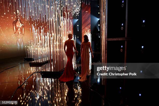 Actresses Charlize Theron and Emily Blunt walk onstage at the 88th Annual Academy Awards at Dolby Theatre on February 28, 2016 in Hollywood,...