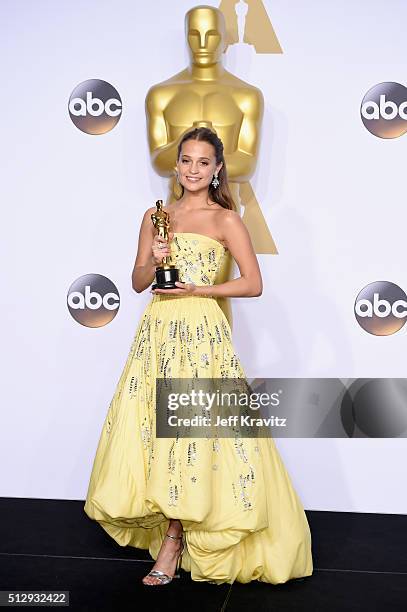 Actress Alicia Vikander, winner of the Best Actress in a Supporting Role award for "The Danish Girl," poses in the press room during the 88th Annual...