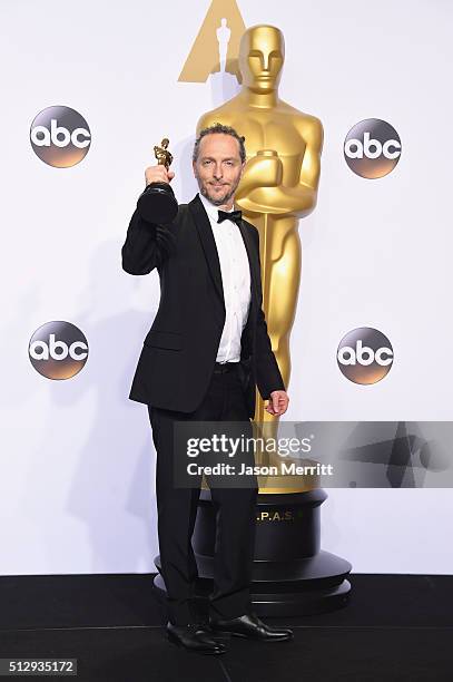 Cinematographer Emmanuel Lubezki, winner of Best Cinematography for 'The Revenant,' poses in the press room during the 88th Annual Academy Awards at...