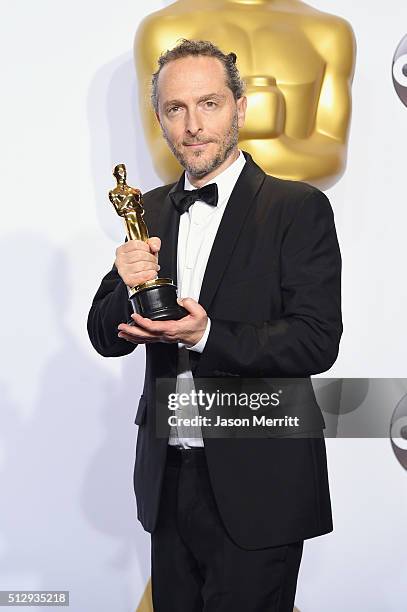 Cinematographer Emmanuel Lubezki, winner of Best Cinematography for 'The Revenant,' poses in the press room during the 88th Annual Academy Awards at...