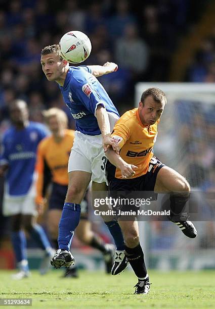 Ian Westlake of Ipswich tackles Jody Morris of Millwall during the Coca Cola Championship match between Ipswich Town v Millwall at Portman Road on...