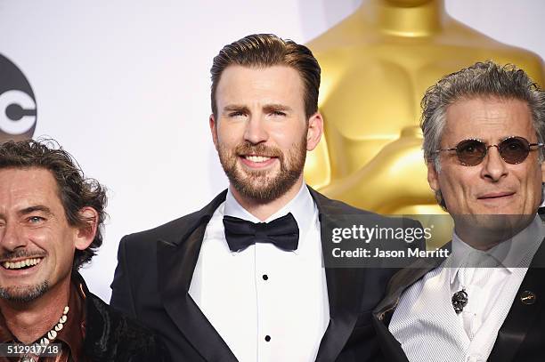 David White, winner of the Best Sound Editing award for 'Mad Max: Fury Road', actor Chris Evans, and Mark A. Mangini winner of the Best Sound Editing...