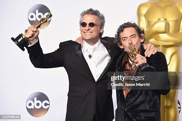 Sound editors David White and Mark A. Mangini winners of the Best Sound Editing award for 'Mad Max: Fury Road,' pose in the press room during the...