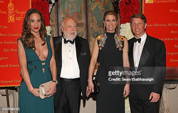 Film producer and Hungarian government film industry commissioner Andrew G Vajna and wife Timea Vajna pose for a photo on the red carpet with United...