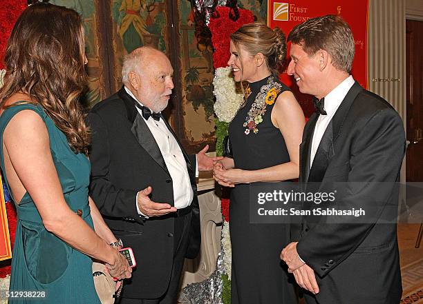 Film producer and Hungarian government film industry commissioner Andrew G Vajna and wife Timea Vajna greet United States ambassador to Hungary...