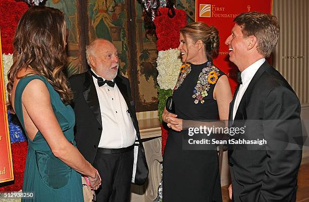 Film producer and Hungarian government film industry commissioner Andrew G Vajna and wife Timea Vajna greet United States ambassador to Hungary...