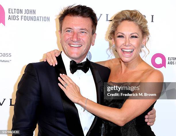 Dancer Kym Johnson and Robert Herjavec attend the 24th Annual Elton John AIDS Foundation's Oscar Viewing Party on February 28, 2016 in West...