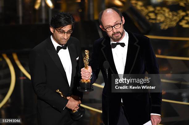 Filmmakers Asif Kapadia and James Gay-Rees accept the Best Documentary Feature award for 'Amy' onstage during the 88th Annual Academy Awards at the...