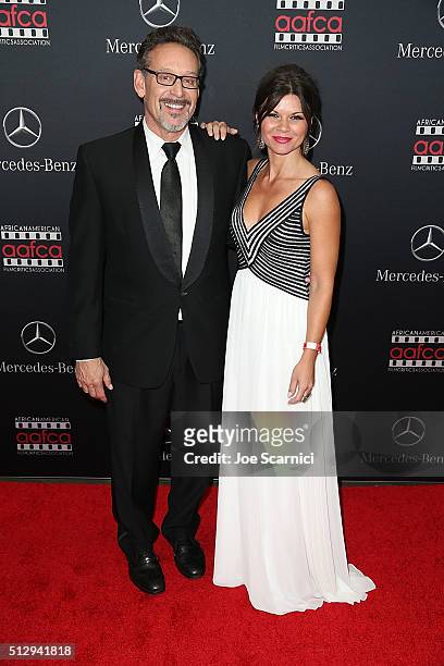 Rob Steinberg and Danielle Vasinova arrive a the Mercedes-Benz and African American Film Critics Association Oscar viewing party at Four Seasons...
