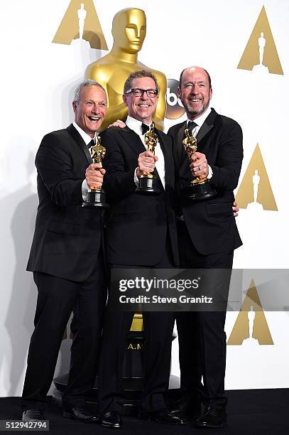 Sound mixers Ben Osmo, Greg Rudloff and Chris Jenkins, winners of the Best Sound Mixing award for 'Mad Max: Fury Road,' pose in the press room during...