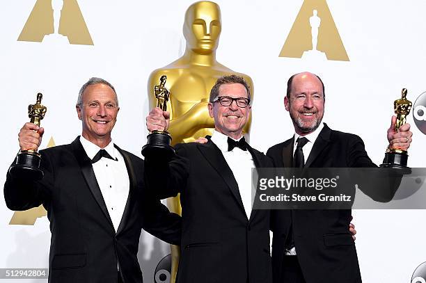 Sound mixers Ben Osmo, Greg Rudloff and Chris Jenkins, winners of the Best Sound Mixing award for 'Mad Max: Fury Road,' pose in the press room during...