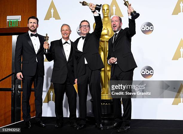Actor Chris Evans and sound mixers Ben Osmo, Greg Rudloff and Chris Jenkins, winners of the Best Sound Mixing award for 'Mad Max: Fury Road,' pose in...