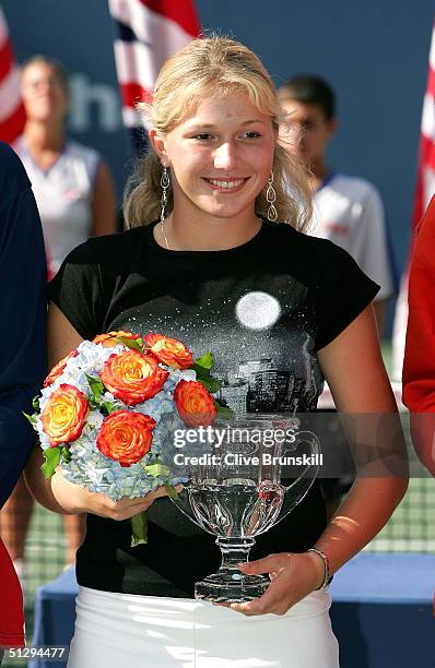 Girl's Junior winner Michaella Krajicek of the Netherlands poses with her trophy after defeating Jessica Kirkland during the US Open September 12,...