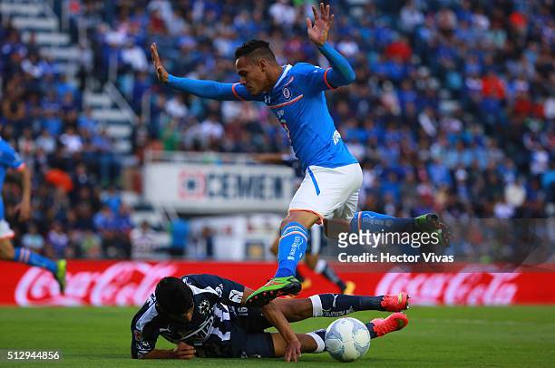 Aldo Ramirez of Cruz Azul struggles for the ball with Candido Ramirez of Monterrey during a 8th round match between Cruz Azul and Monterrey as part...