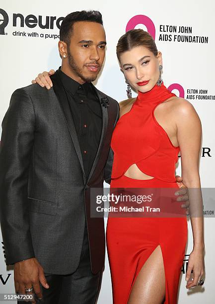 Lewis Hamilton and Hailey Baldwin arrive at the 24th Annual Elton John AIDS Foundation's Oscar viewing party held at West Hollywood Park on February...