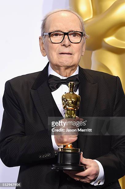 Composer Ennio Morricone winner of the Best Original Score award for ''The Hateful Eight' poses in the press room during the 88th Annual Academy...
