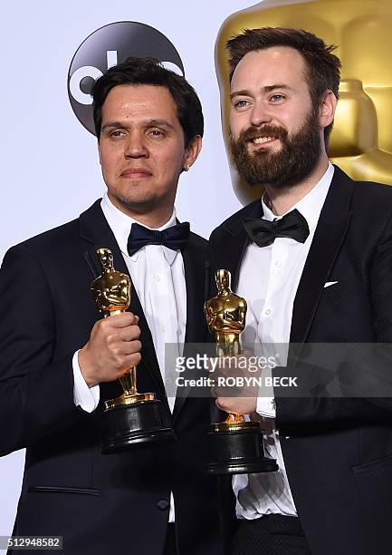 Benjamin Cleary and Shan Christopher Ogilvie pose with their Oscar for Best Live Action Short Film, "Stutterer," in the press room during the 88th...