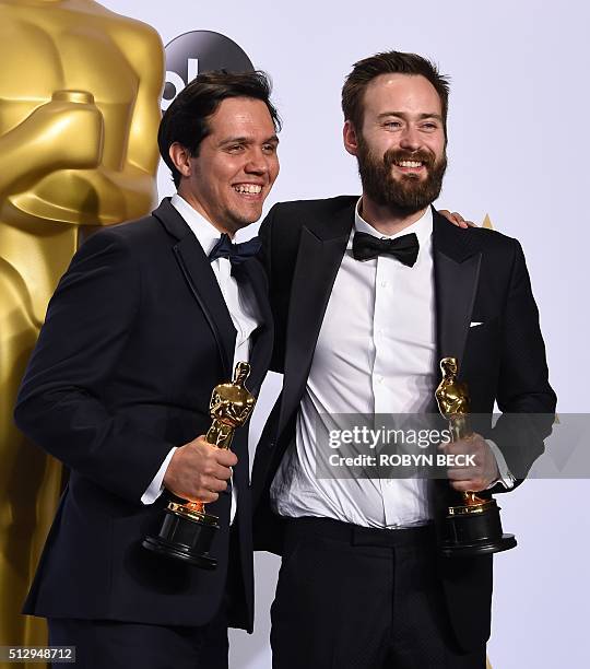 Benjamin Cleary and Shan Christopher Ogilvie pose with their Oscar for Best Live Action Short Film, "Stutterer," in the press room during the 88th...