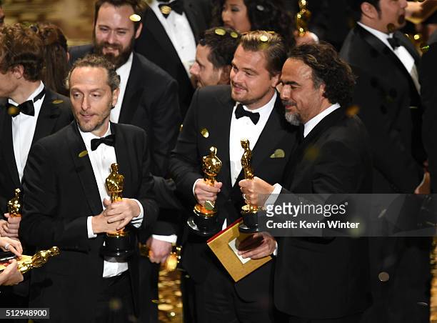 Cinematographer Emmanuel Lubezki, actor Leonardo DiCaprio and director Alejandro Gonzalez Inarritu, all winners for 'The Revenant,' pose onstage...