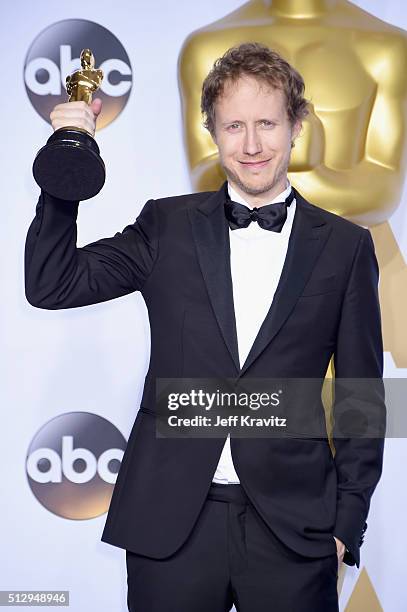 Filmmaker Laszlo Nemes, winner of the Best Foreign Language Film award for 'Son of Saul,' poses in the press room during the 88th Annual Academy...