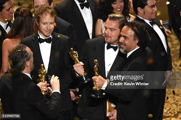 Director Laszlo Nemes , winner of Best Foreign Language Film for 'Son of Saul,' looks on as cinematographer Emmanuel Lubezki , winner of Best...