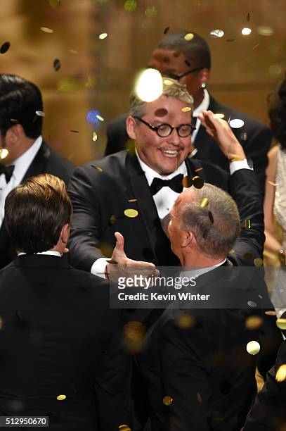 Writer-director Adam McKay , winner of Best Adapted Screenplay for 'The Big Short,' celebrates onstage during the 88th Annual Academy Awards at the...