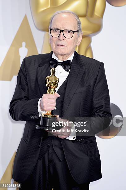 Composer Ennio Morricone, winner of the Best Original Score award for ''The Hateful Eight,' poses in the press room during the 88th Annual Academy...