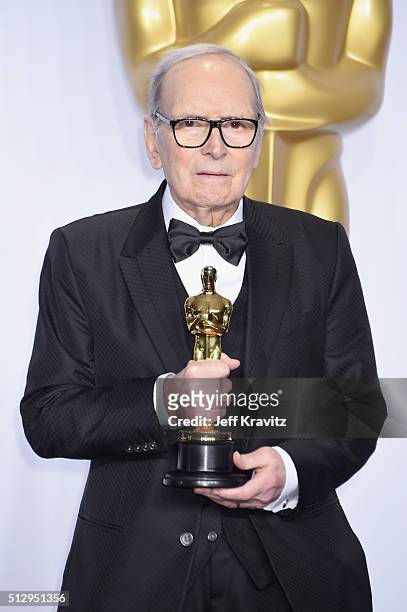 Composer Ennio Morricone, winner of the Best Original Score award for ''The Hateful Eight,' poses in the press room during the 88th Annual Academy...