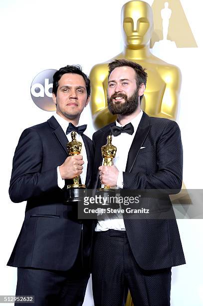 Producer Shan Christopher Ogilvie and director Benjamin Cleary, winners of the Best Live Action Short award for 'Stutterer,' pose in the press room...