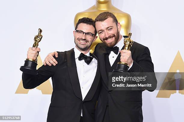 Songwriter Jimmy Napes and singer Sam Smith, winners of the award for Best Original Song 'Writing's on the Wall,' pose in the press room during the...