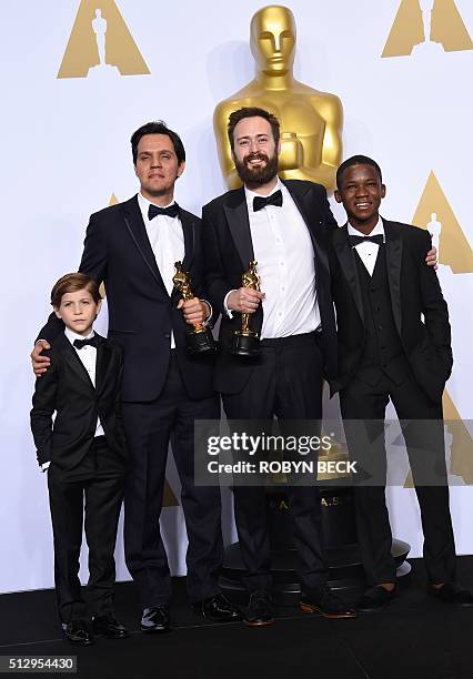 Actor Jacob Tremblay, Shan Christopher Ogilvie, Benjamin Cleary, winners of Best Live Action Short Film for 'Stutterer,' and actor Abraham Attah pose...