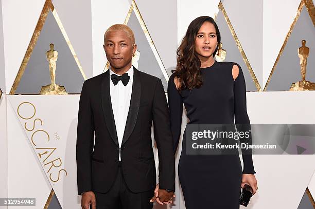 Musician Pharrell Williams and Helen Lasichanh attend the 88th Annual Academy Awards at Hollywood & Highland Center on February 28, 2016 in...