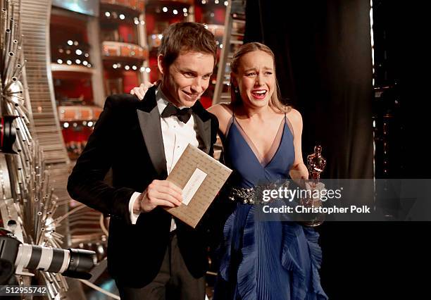 Actors Eddie Redmayne and Brie Larsen walk offstage during the 88th Annual Academy Awards at Dolby Theatre on February 28, 2016 in Hollywood,...