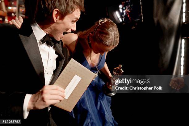 Actors Eddie Redmayne and Brie Larsen walk offstage during the 88th Annual Academy Awards at Dolby Theatre on February 28, 2016 in Hollywood,...