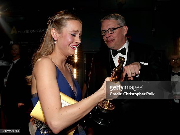 Actress Brie Larson , winner of Best Actress for 'Room,' and director Adam McKay, winner of Best Adapted Screenplay for 'The Big Short,' backstage at...