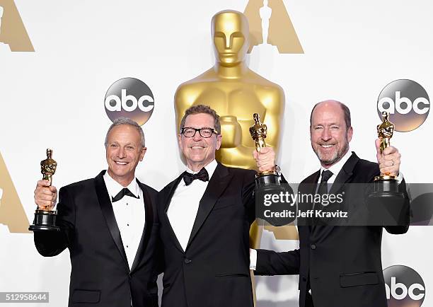 Sound editors Ben Osmo, Gregg Rudloff, and Chris Jenkins, winners of Best Sound Mixing for 'Mad Max: Fury Road,' pose in the press room during the...