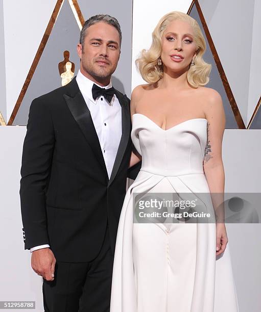 Singer/actress Lady Gaga and actor Taylor Kinney arrive at the 88th Annual Academy Awards at Hollywood & Highland Center on February 28, 2016 in...