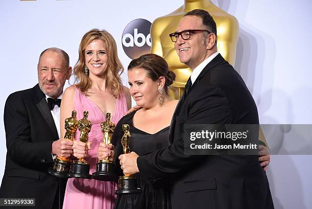 Producers Steve Golin, Nicole Rocklin, Blye Pagon Faust, and Michael Sugar, winners of Best Picture for "Spotlight," pose in the press room during...