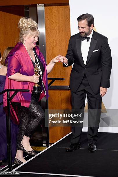 Set decorator Lisa Thompson , winner of the Best Production Design award for 'Mad Max: Fury Road,' poses with actor Steve Carell in the press room...