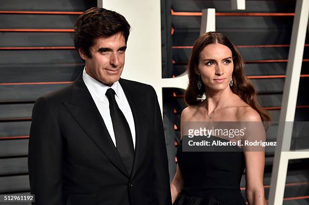 Illusionist David Copperfield and Chloe Gosselin attend the 2016 Vanity Fair Oscar Party hosted By Graydon Carter at Wallis Annenberg Center for the...