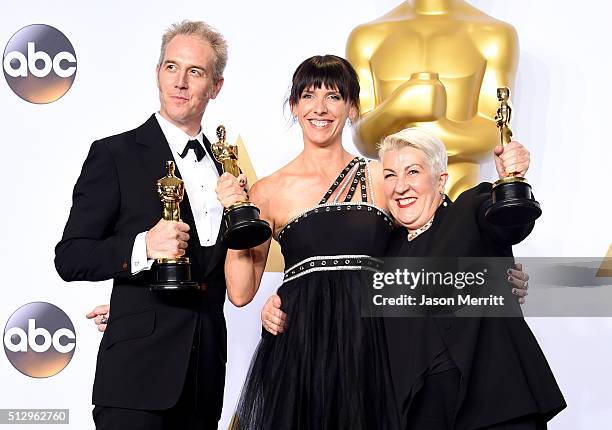 Makeup artists Damian Martin, Elka Wardega, and Lesley Vanderwalt, winners of Best Makeup for 'Mad Max,' pose in the press room during the 88th...