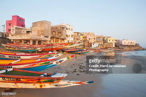fishing boats on place n'gor,dakar, senegal - senegal stock pictures, royalty-free photos & images